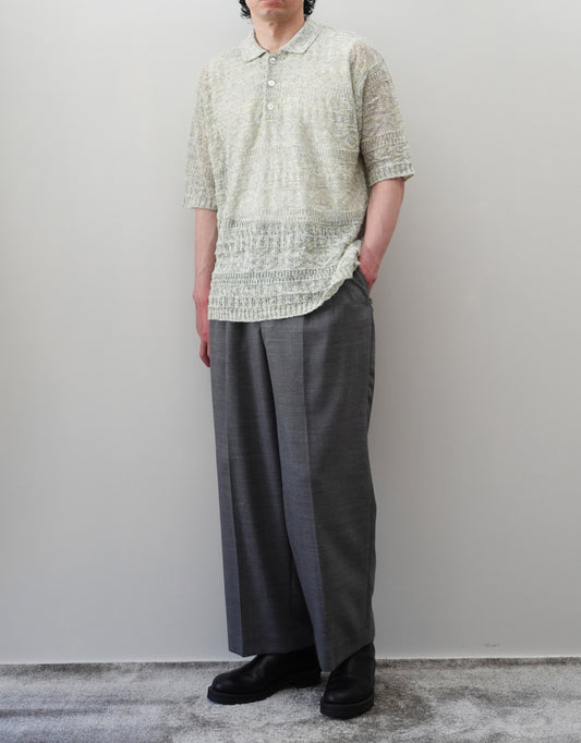 VOUILLON（ヴイヨン）のOpenwork Stitch Polo Linen Knit Shirt（オープンワークステッチポロリネンニットシャツ）。涼しげな透かし編み（オープンワーク）を施した、リネン素材のポロ襟ニットシャツ。独特の透け感とリラクシングなシルエットが特徴。モデル着用正面全身画像。